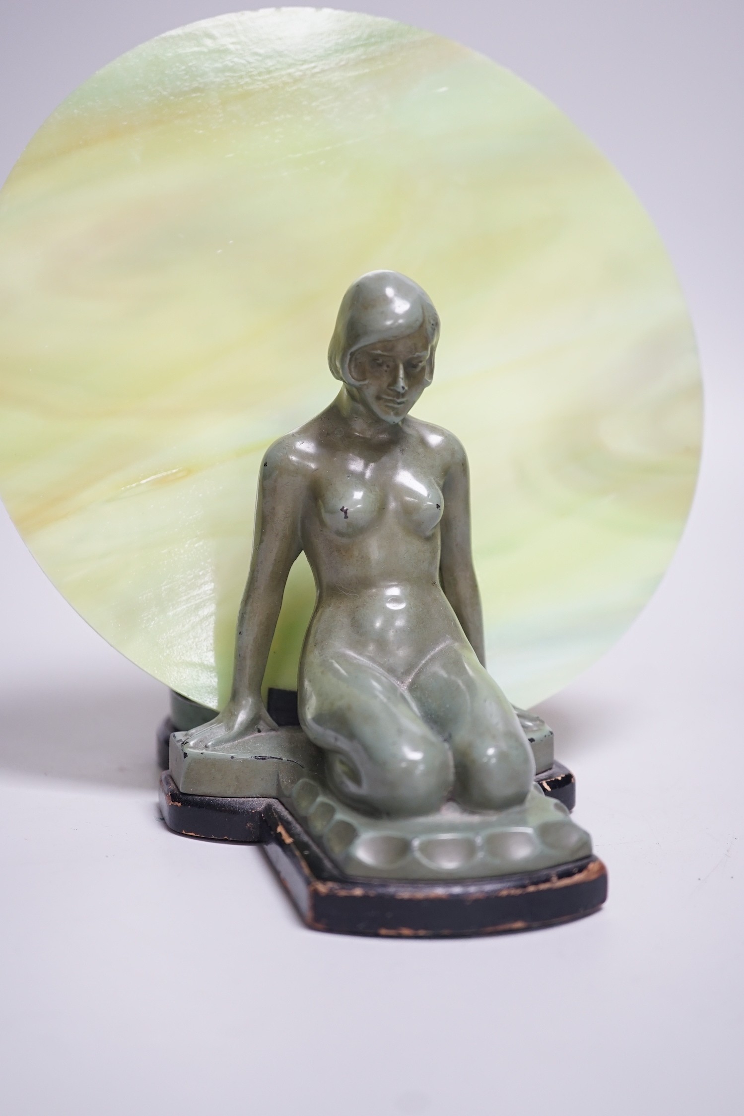 An Art Deco lady lamp with original glass. 21cm high